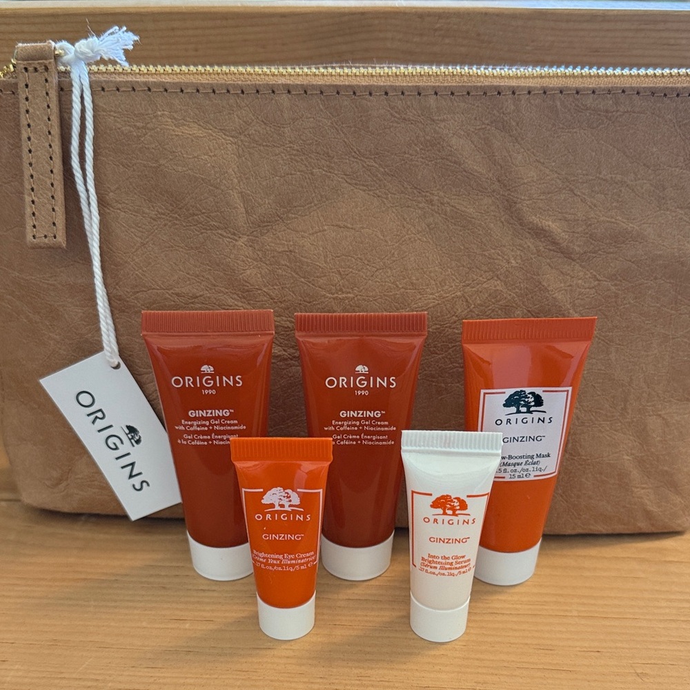 NWT Origins Ginzing Line-gel and eye creams, serum, mask plus reusable zip bag